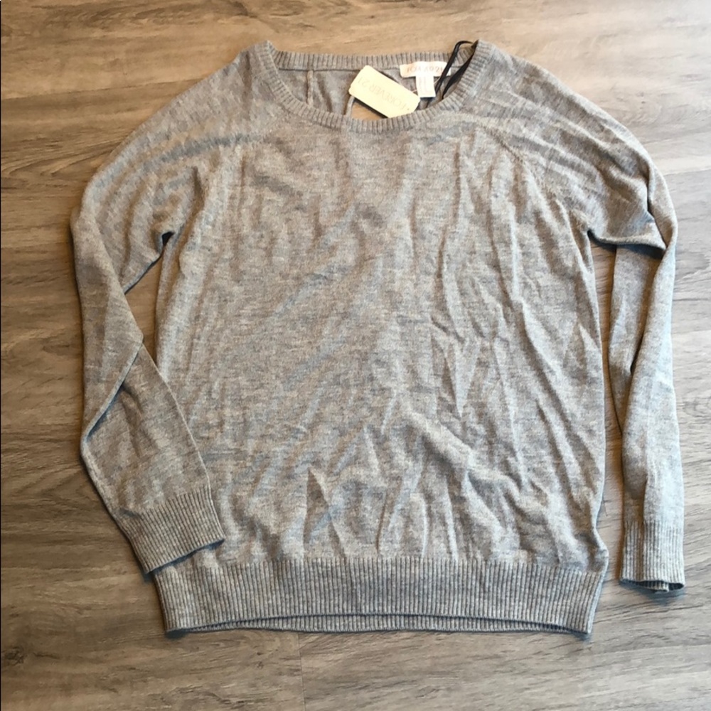 NWT Gray sweater with double hole design in back